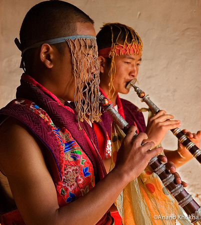 Monks playing traditional "Lingm" Flute, Bhutan