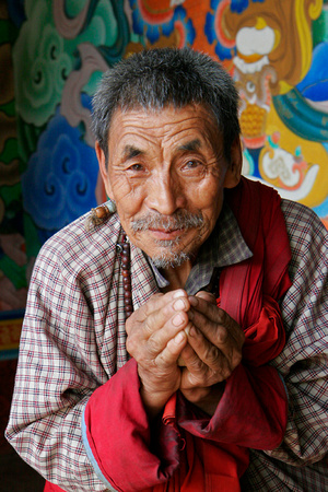 Old Man Offering his prayers, Bhutan