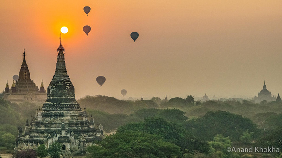 Sunrise over Buddhist temples