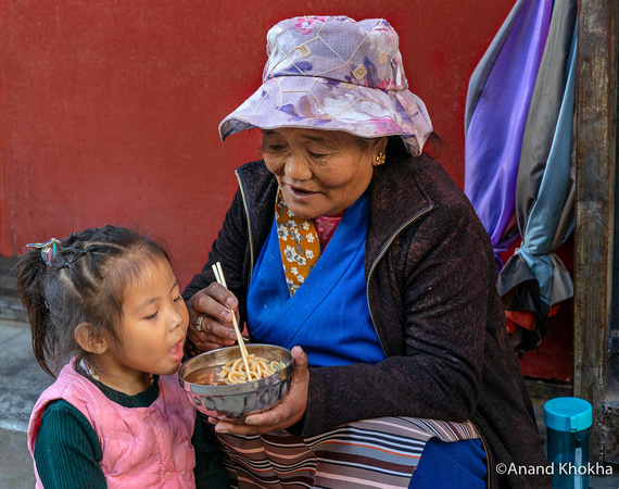 Grandmother and child. Kora around Joking Temple, Lhasa