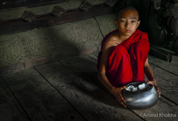 Novice monk with the Rice Bowl