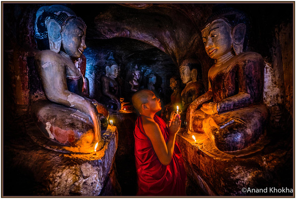 Offering Prayers in a cave temple