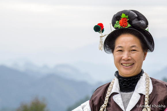 Woman dressed for Festival--Black Miao tribe