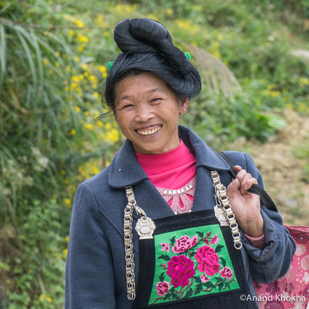 Woman dressed for Festival--Black Miao Tribe