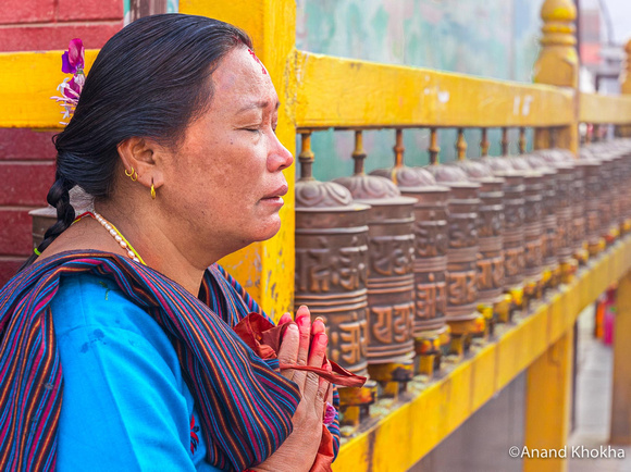 Tibetan Woman  Praying, Bodhnath, Nepal