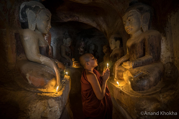 Monk offering prayers, Monywa, Burma